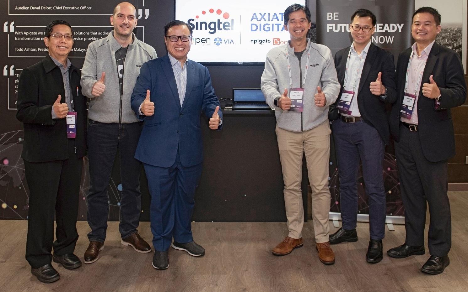 (From 2nd left) Apigate CEO Zoran Vasiljev, Singtel International Group CEO Arthur Lang and Axiata Digital CEO Mohd Khairil Abdullah
