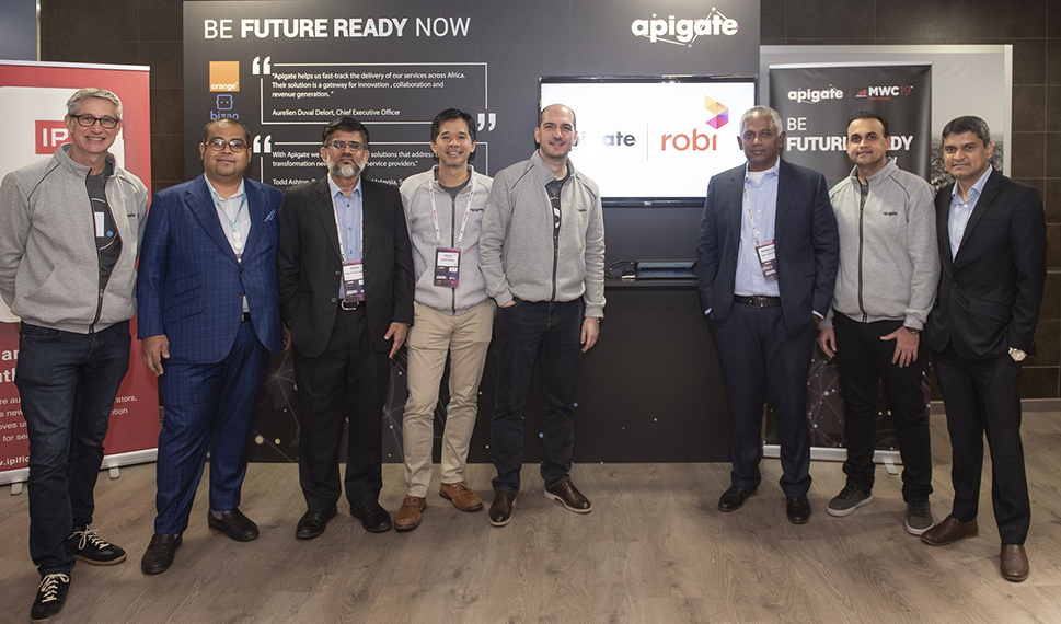 (From 4th left) Axiata Digital CEO Mohd Khairil Abdullah , Apigate CEO Zoran Vasiljev and Robi Axiata Limited CEO and MD Uddin Ahmed