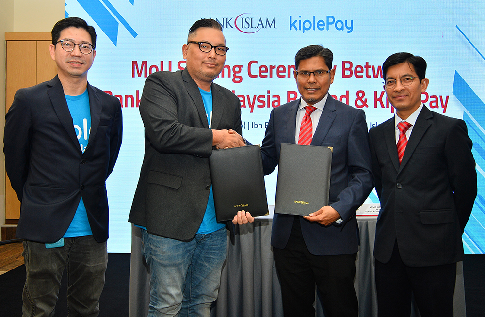(From left) KiplePay CEO Tan Kay Yen; KiplePay Business Development director Ricky Lew; Bank Islam head of Deposit and Cash Management Mohd Noor Jab; and Bank Islam CEO Mohd Muazzam Mohamed