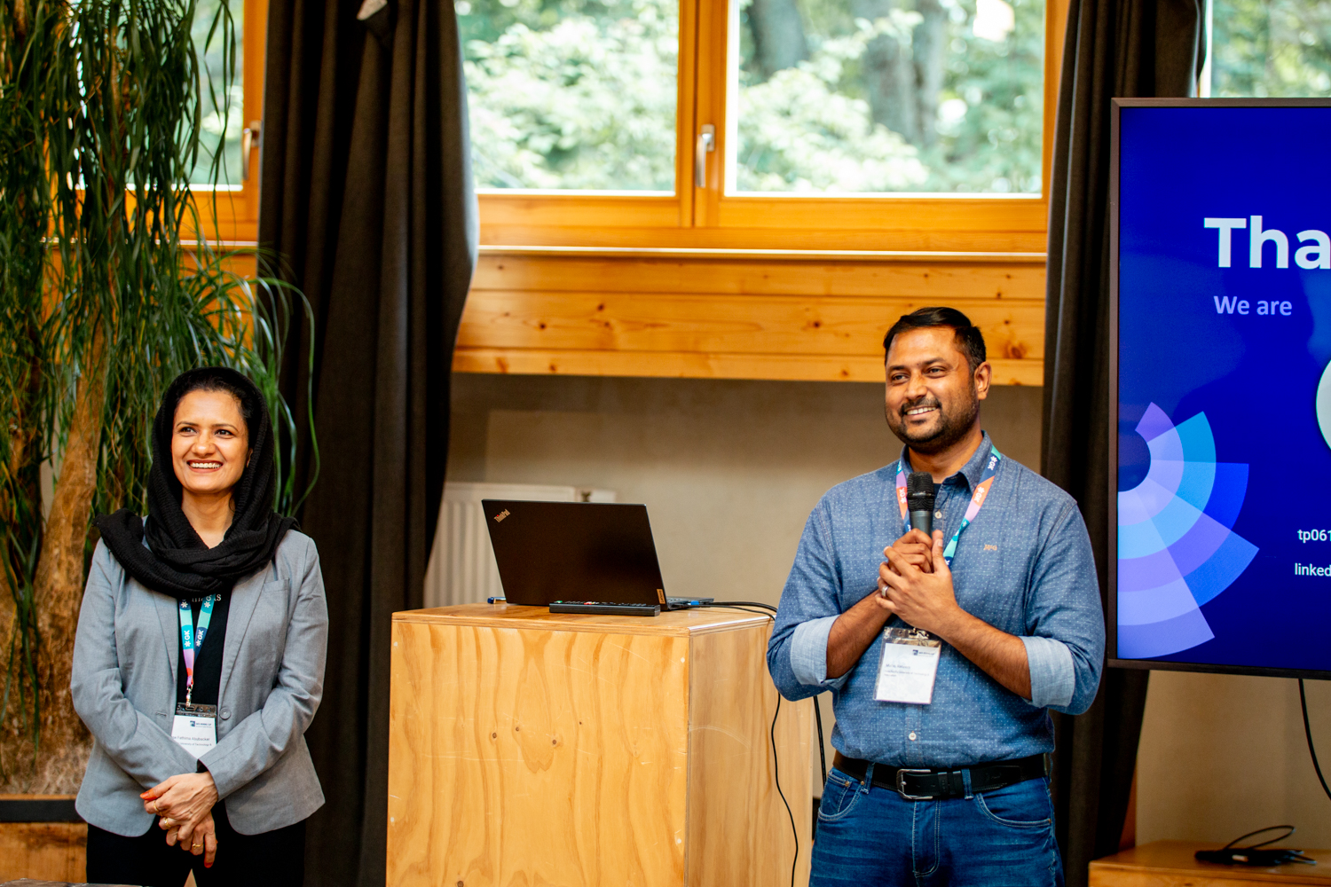 (L to R) Asso Prof Dr. Nirase Fathima Abubacker and Mafas Raheem, senior lecturers at APU presenting to judges and fellow winners in Berlin on the analytics model that won them a Top 3 spot in the Data Mining Cup 2023.