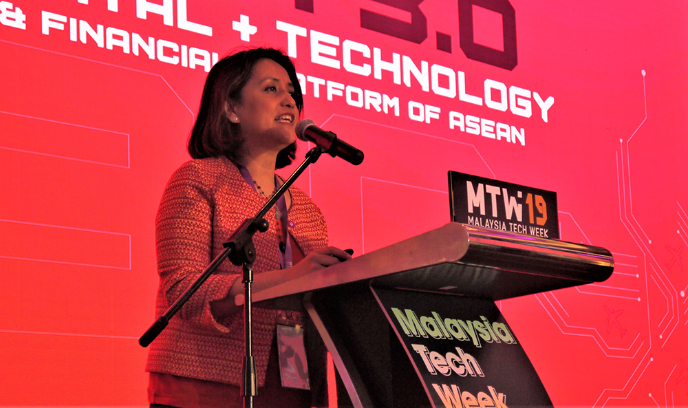 Lady under the red spotlight. AirAsia deputy group CEO Aireen Omar giving her keynote at Malaysia Tech Week 2019.