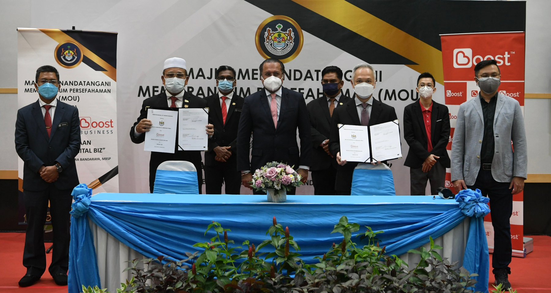 Signing ceremony between MBSP and Boost Biz