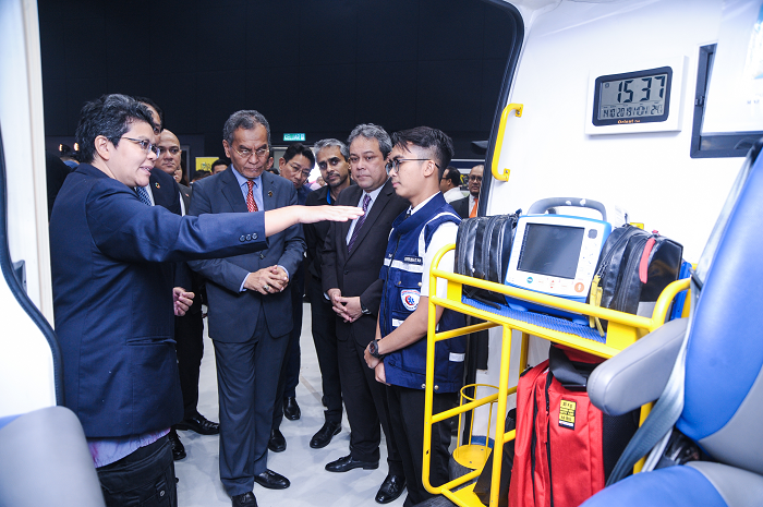 Malaysian Minister of Health Dr Dzulkefly Ahmad listening to a Connected Ambulance briefing.