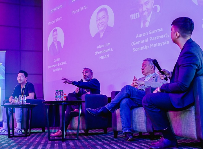A panel from the 2023 DisruptInvest panel held at MRANTI in Kuala Lumpur.
