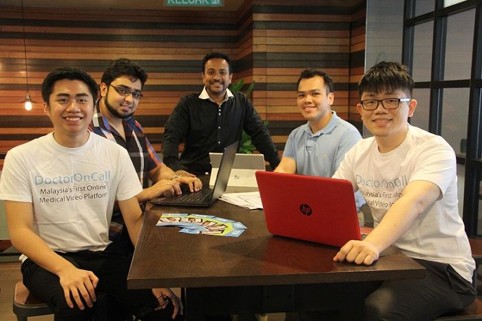 DoctorOnCall cofounders Maran Virumandi (third from left) and Hazwan Najib (second from right) with their team.