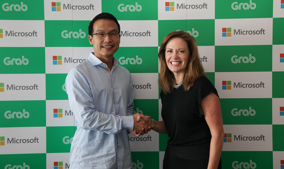 Grab president Ming Maa (left) with Microsoft executive VP Peggy Johnson