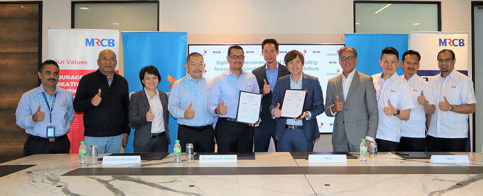 Azlan Zainal Abidin, Chief Enterprise Business Officer of Celcom (fifth from the left), and Kwan Joon Hoe, Group Chief Operating Officer, MRCB (seventh from left), inked a collaboration to form  a partnership, in exploring sustainable cutting-edge building solutions.