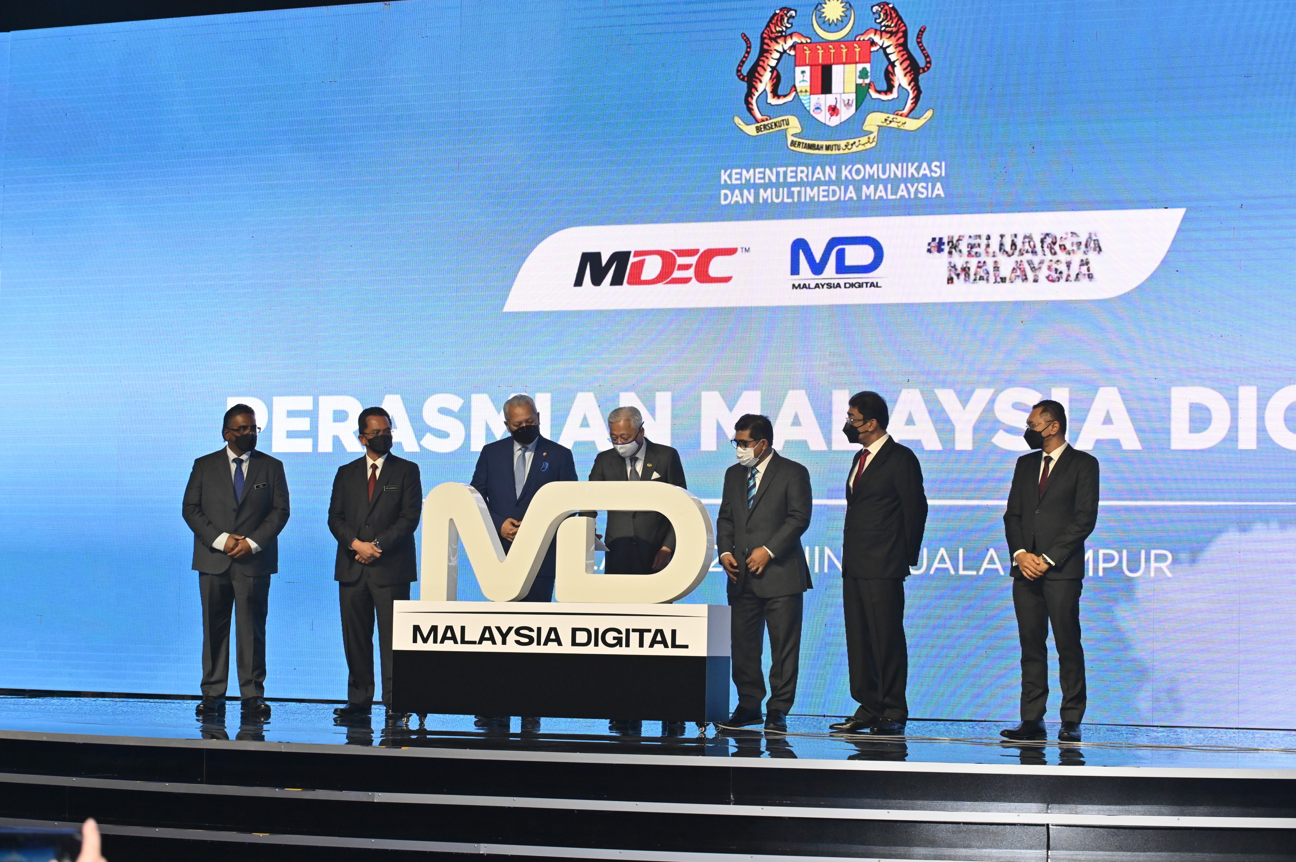 Prime minister Ismail Sabri (fourth from left) launches Malaysia Digital, with several government officials witnessing