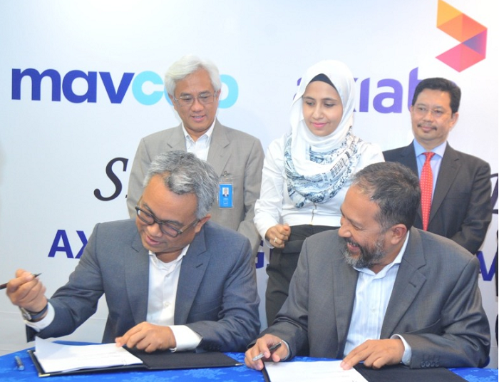 Jamaludin Bujang (right) signing a co-investment deal with Idham Nawawi, Chief Corporate Officer of Axiata Group Bhd in 2016 for the partnership with Axiata Digital Innovation Fund or ADIF. With its new mandate, this type of Fund of Fund deal will be the only type of investment it is allowed to make.