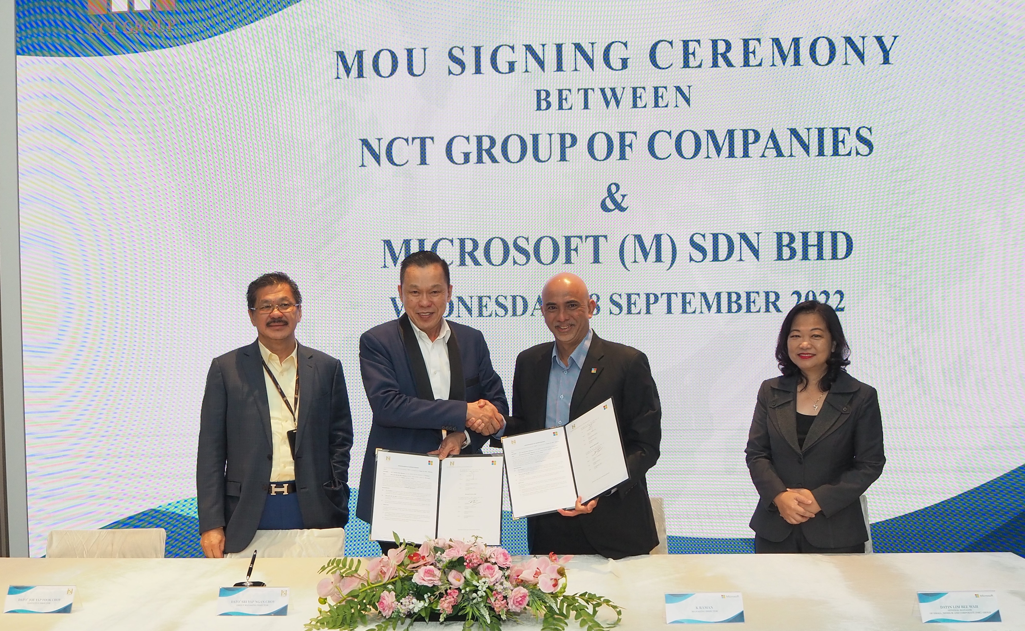 Left to right Yap Fook Choy, group executive director of NCT Group; Yap Ngan Choy, founder and group managing director of NCT Group; K Raman, managing director of Microsoft Malaysia and Lim Bee Wah, general manager of Small, Medium and Corporate Group of Microsoft Malaysia during the signing ceremony.