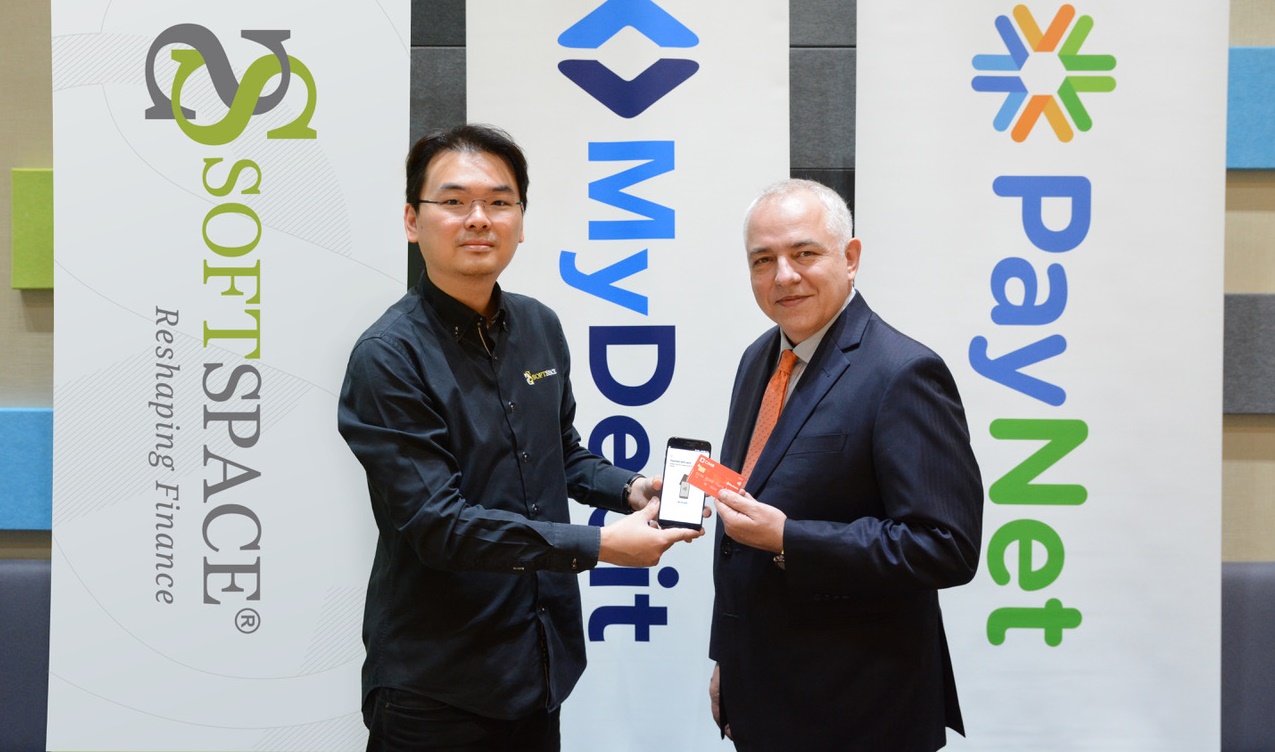 PayNet group CEO Peter Schiesser (right) with Soft Space CEO Joel Tay