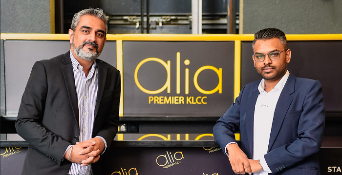 Sandeep Grewal *left) with Aravind Sinniah at the 5-star hotel they are managing, which represents an expansion of their business strategy.