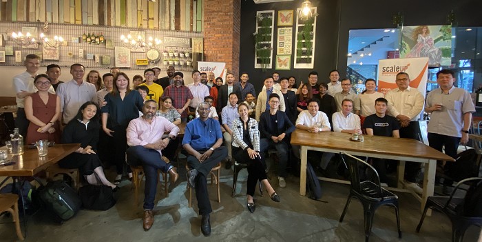 The authors, Aaron Sarma (2nd from left, seated) and Dr V Sivapalan (3rd from left) with the first cohort of startups their Scaleup Malaysia invested in, Feb 2020. They are urging the government of Prime Minister Anwar Ibrahim to hit the Reboot to drive Malaysia's startup ecosystem to greater heights.