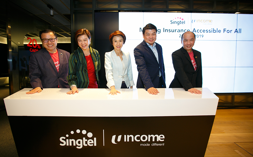 (From left) Singtel CEO of International Arthur Lang; Singtel group CEO Chua Sock Koong; Senior Parliamentary Secretary for Manpower Low Yen Ling; NTUC Income CEO Andrew Yeo; and Singtel CEO of Consumer Singapore Yuen Kuan Moon
