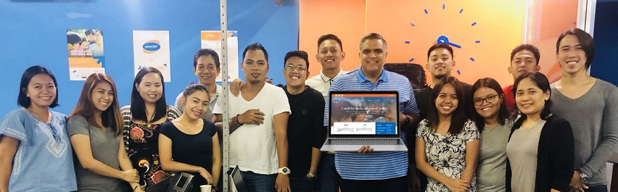 The AsiaKredit team in Manila, led by CEO/co-founder Michael Singh (centre)