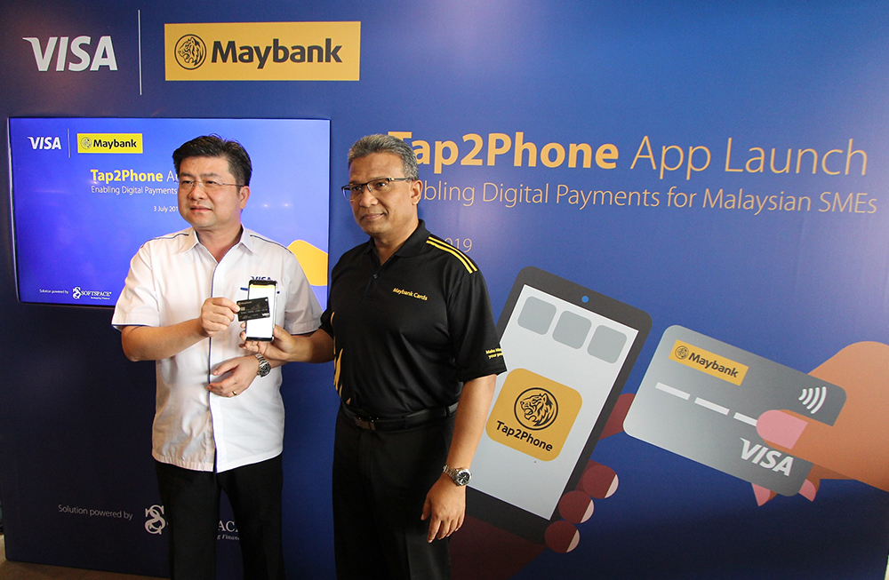 Visa Country Manager for Malaysia Ng Kong Boon (left) with Maybank Community Financial Services Malaysia head Hamirullah Boorhan