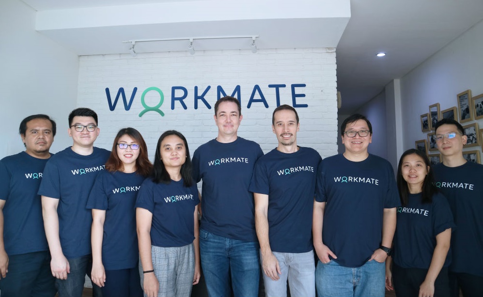 Workmate CEO and Co-founder Mathew Ward (centre) with his team